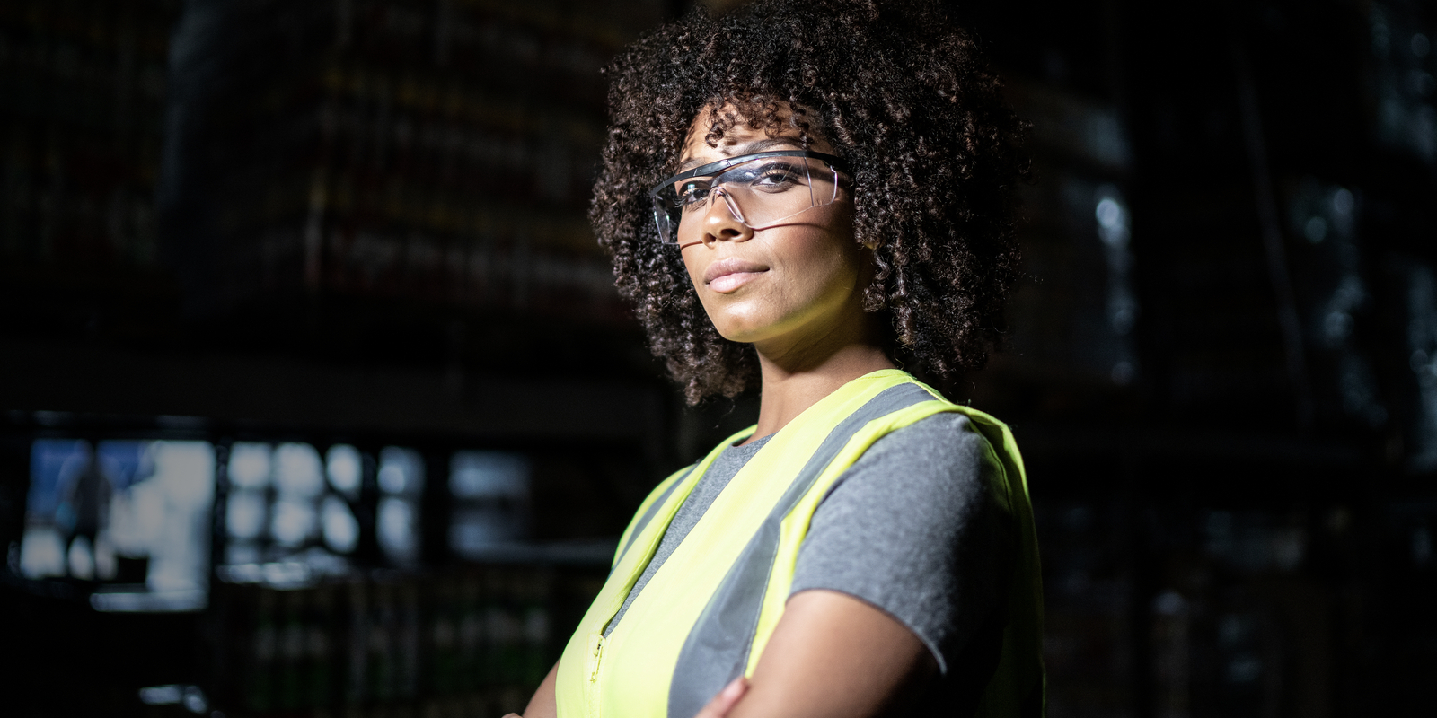 Portrait of a young woman in a warehouse