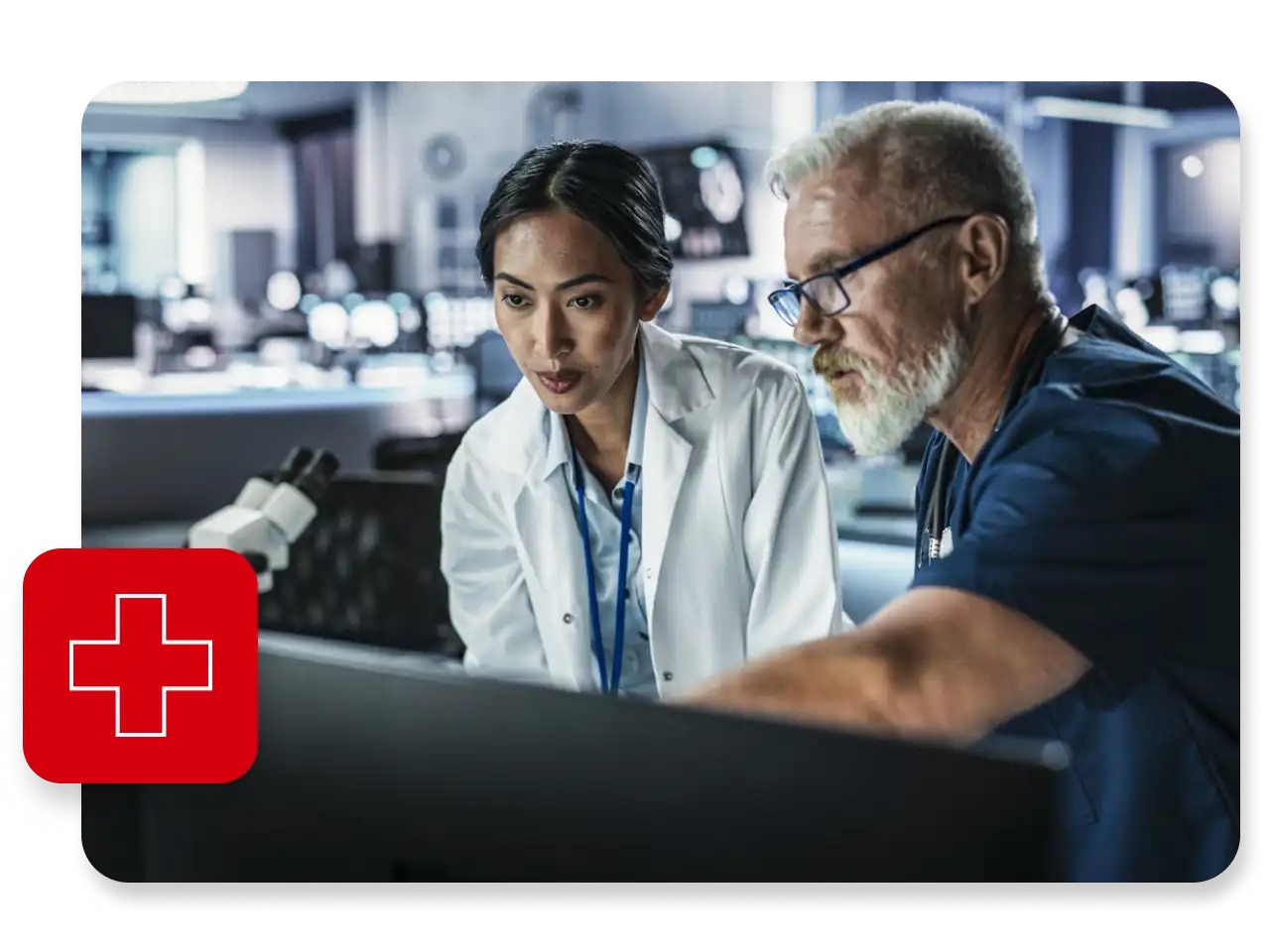 Scientist using population health analytics on a desktop computer