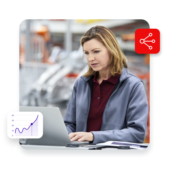 932691466_Female-engineer-using-laptop-in-car-plant_iStock