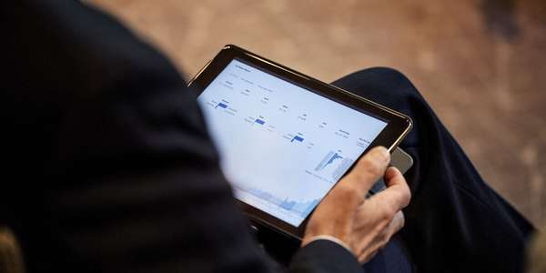 business man on digital tablet