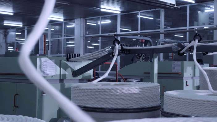 photo of equipment inside of a recycling plant