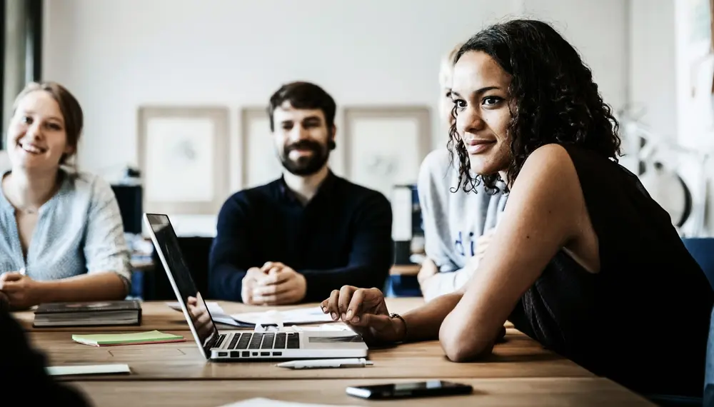 Workers collaborating in a meeting