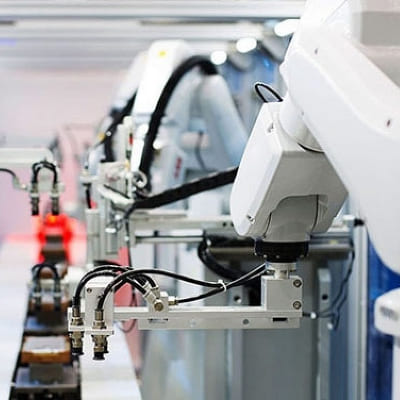 factory robotic arms on the assembly line
