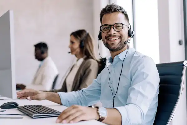 Call center operators working in the office