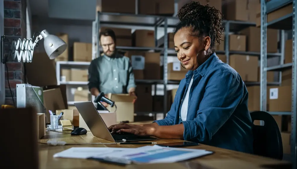Staff doing inventory in a stockroom
