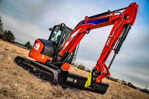 photo of a red digging tractor