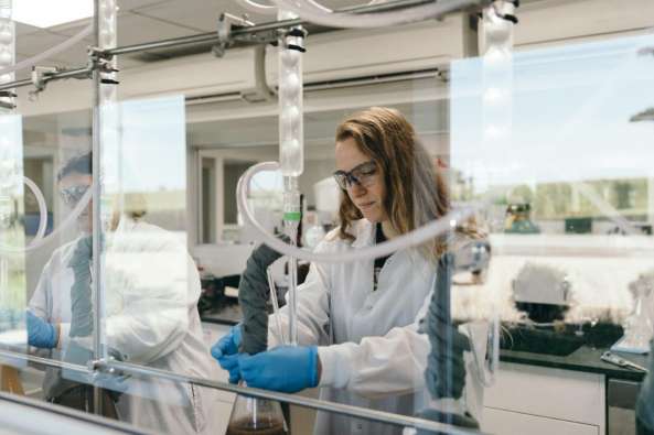 food scientist making food in the frontier co op facility