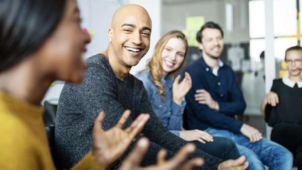 Business team smiling during a meeting