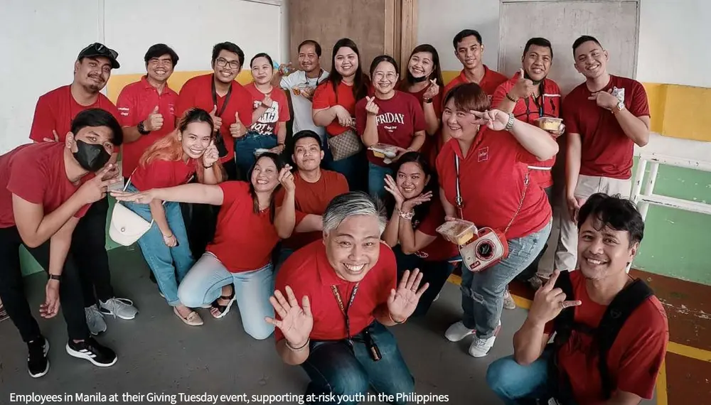 Infor employees at a Giving Tuesday event, supporting at-risk youth in the Philippines