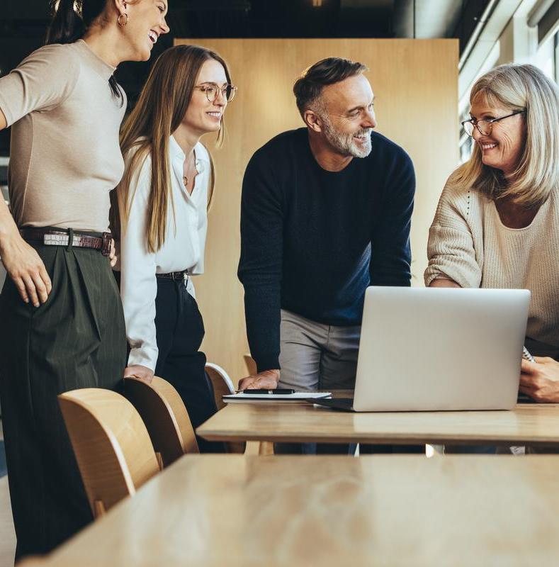 A group of people sitting at a table