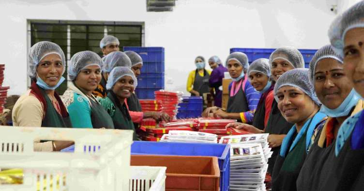 chocolate manufacturers working in a factory