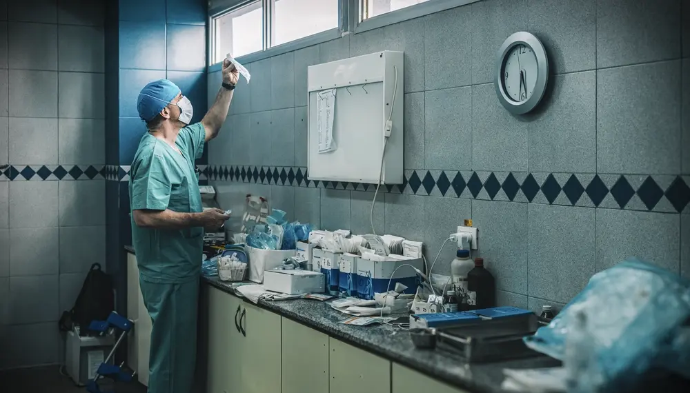 Anesthesiologist inspecting supplies