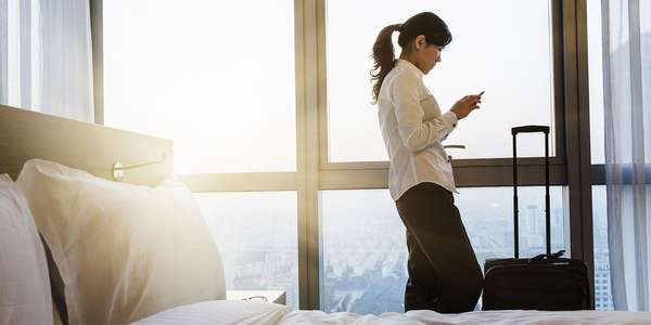 hotel business travel mobile phone woman   header 