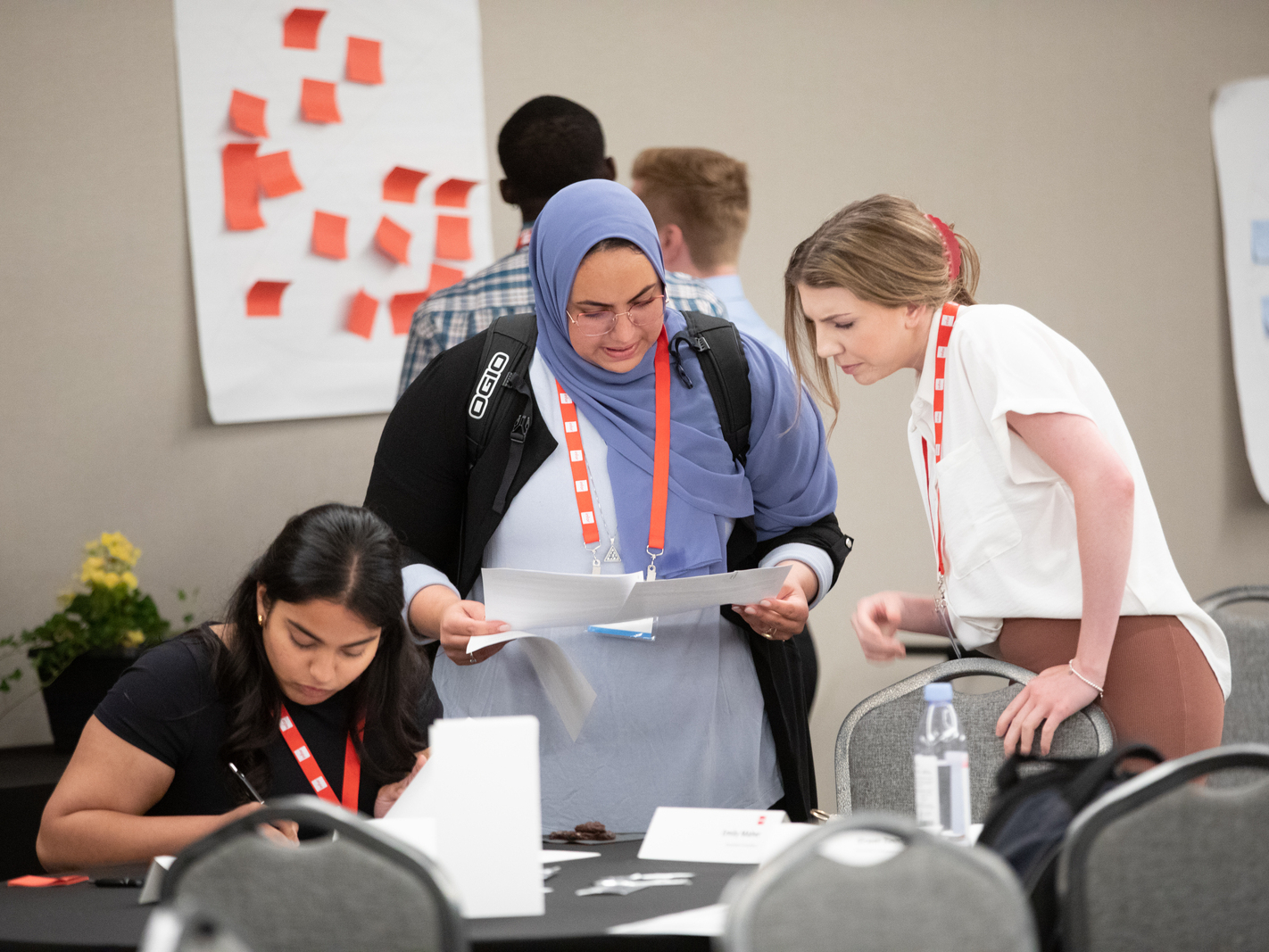 Inforians collaborating in a conference room 