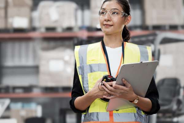 Portrait of Female Warehouse Supervisor working in leading distribution warehouse