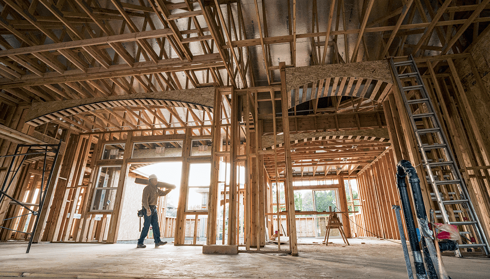 A person building a house