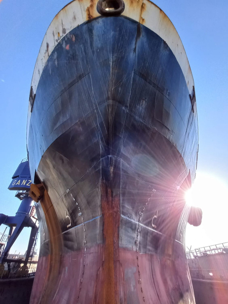 ship hull under repair in drydock