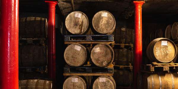 wooden casks barrels warehouse red pillars
