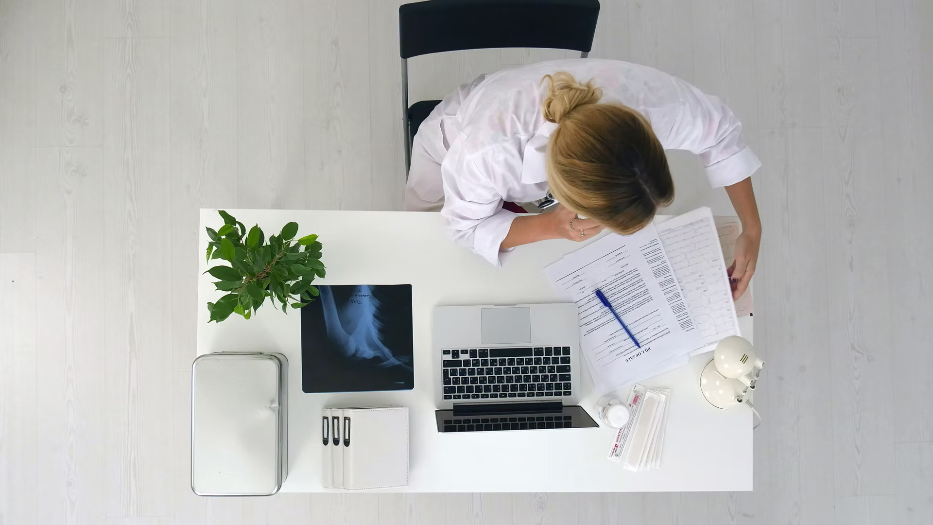 healthcare professional at her desk