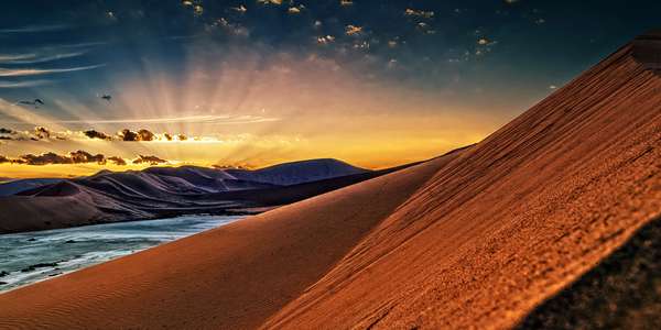 sand dunes at sunset 