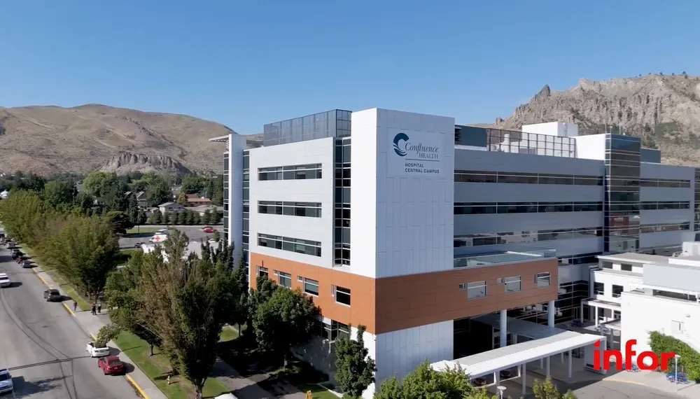 Confluence Health hospital with mountains located directly behind the office 