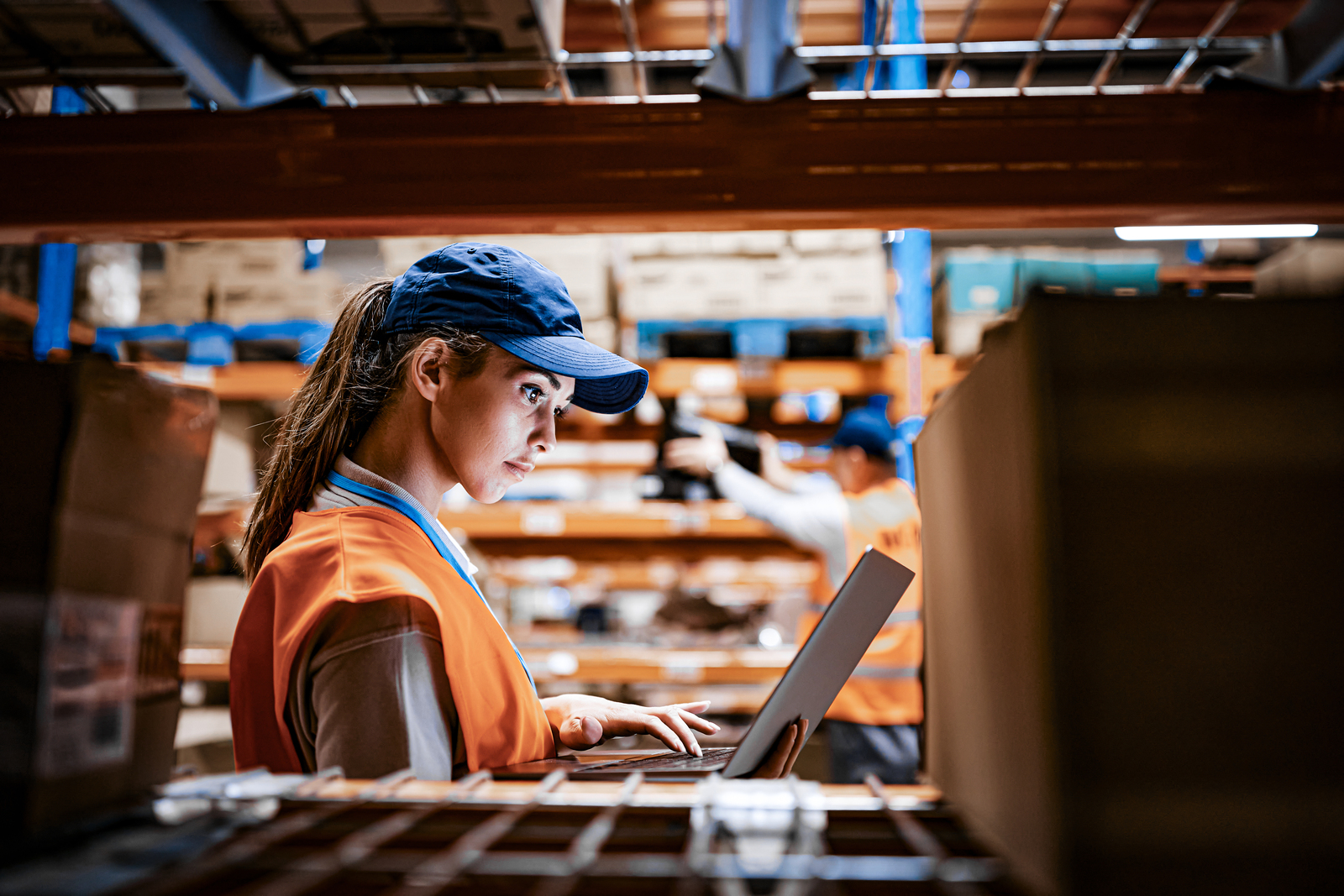 1396631779 Female worker using&#xA;  laptop while working at distribution warehouse Getty.jpg