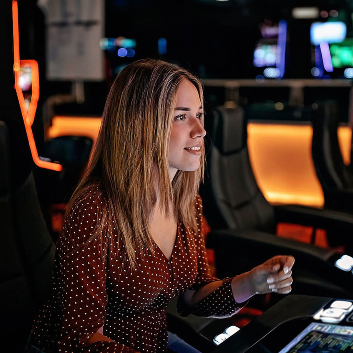 A woman enjoys at the slot machines at a casino using artificial intelligence 