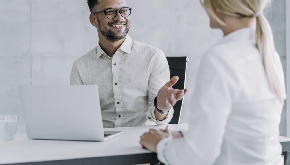 Business partners in a meeting discussing AI