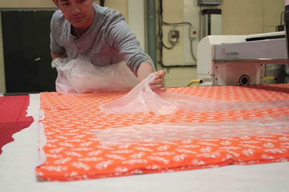 a clothing maker working with fabrics and textiles