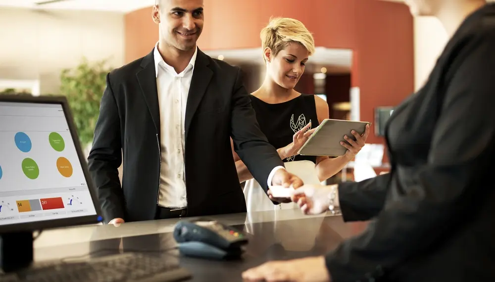 Guests checking into a hotel 