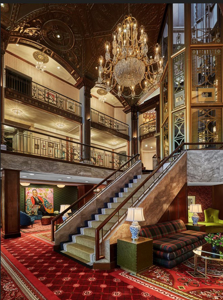 hotel lobby stairs elevator couch carpet