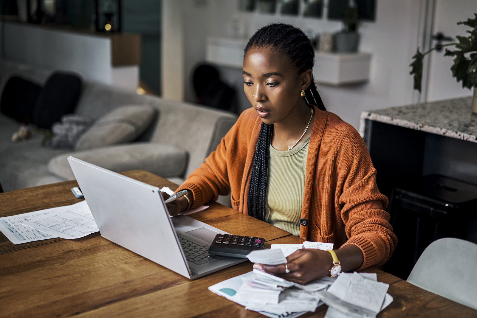 1438452854 Black woman, budget&#xA;  and home finance on laptop for accounting, money planning and fintech&#xA;  investment Getty Edited tif