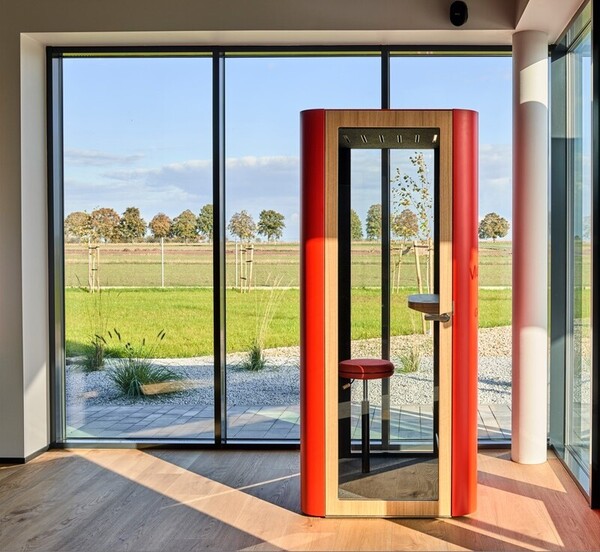 acoustic pod stool office wall of windows