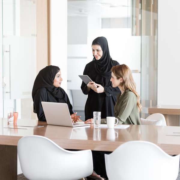 female colleagues middle east dubai
  office discussion HR