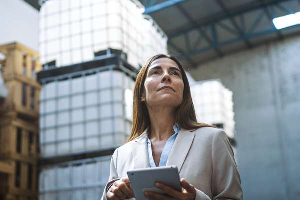 Executive using enterprise AI on a tablet