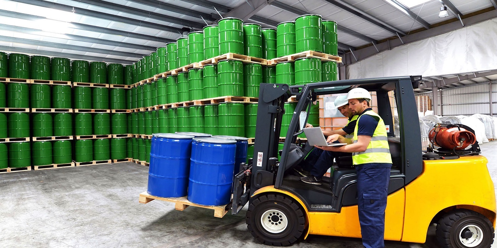 chemicals workers in a warehouse