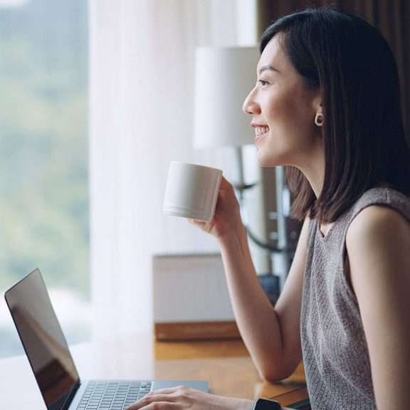 professional woman working on her laptop