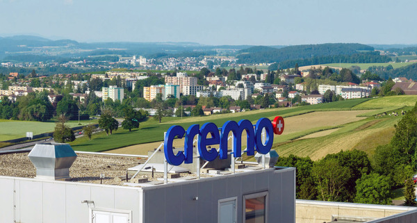 creamery with town and mountains in background