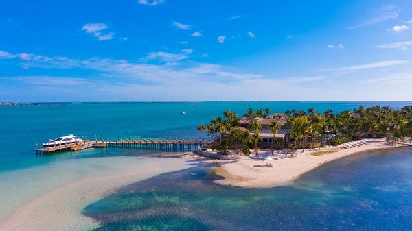 ocean tropical island with boat pier 