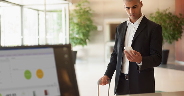 Man on mobile phone at hotel