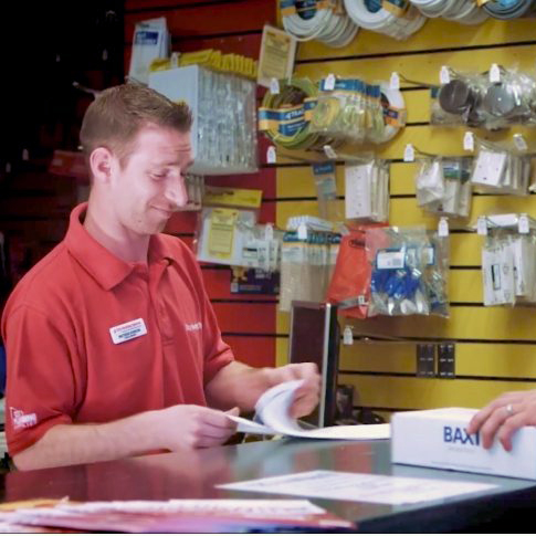 man at auto parts counter