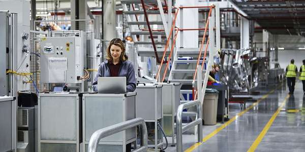 ERP manufacturing automotive factory modern technology laptop
