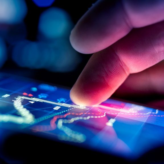 Person using an AI-powered dashboard on a tablet