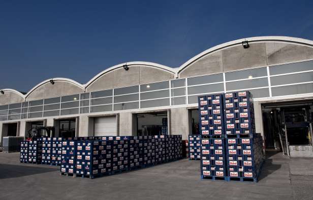 pallets of beer lined up outside and ready for shipping