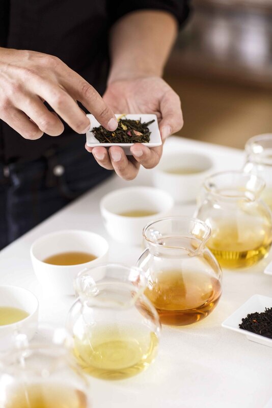 Palais des Thés tea tasting table with carafes