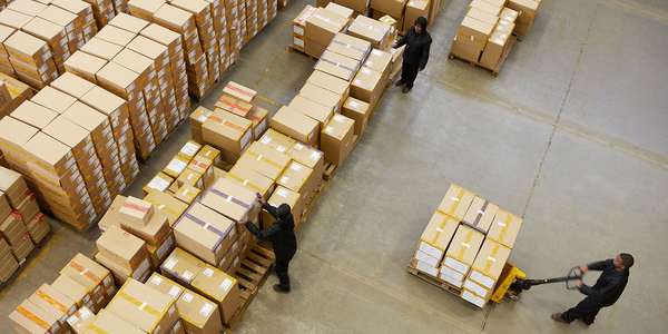 142227991 Distribution warehouse scm   shipping boxes Bkgrd mono Dist Getty 