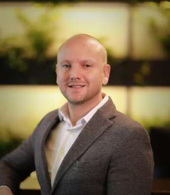 portrait photo of the general manager of botanique hotel prague