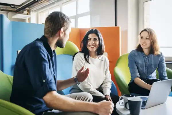 Meeting between three team leaders in office