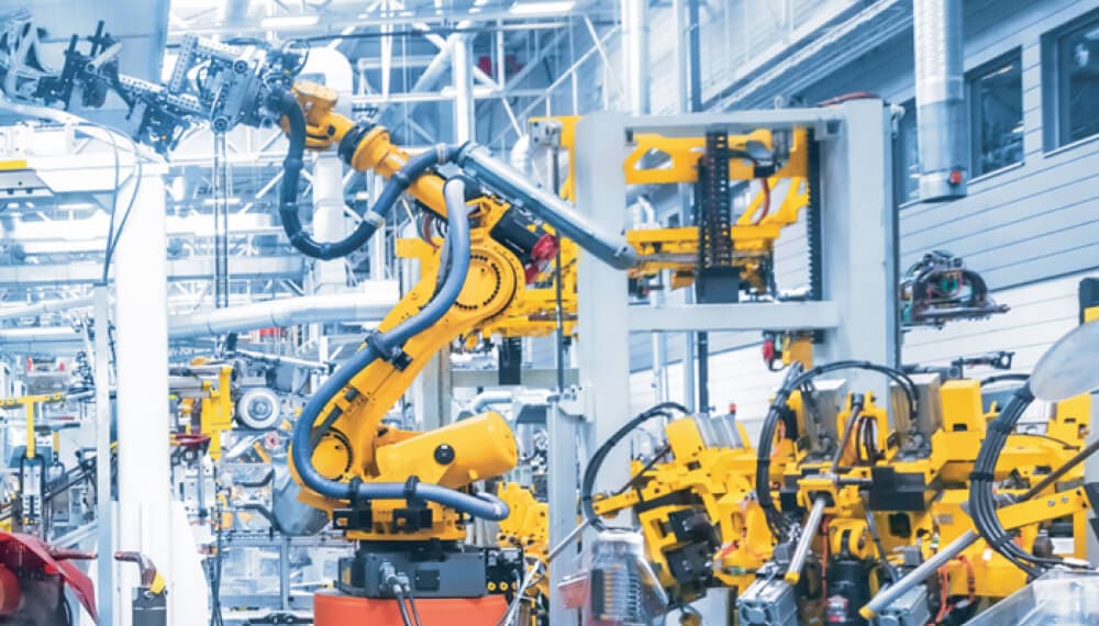 Yellow industrial machines inside a factory