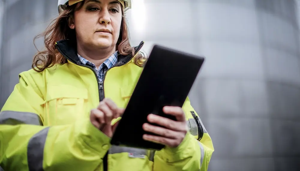 Manager using utilities software on a tablet